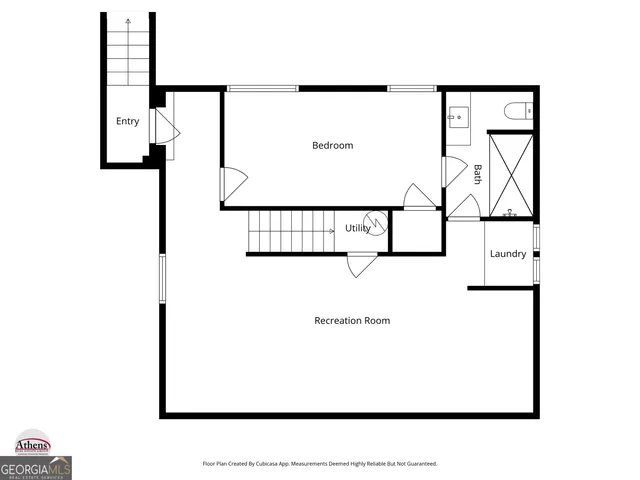 a picture of a bench in front of a wall