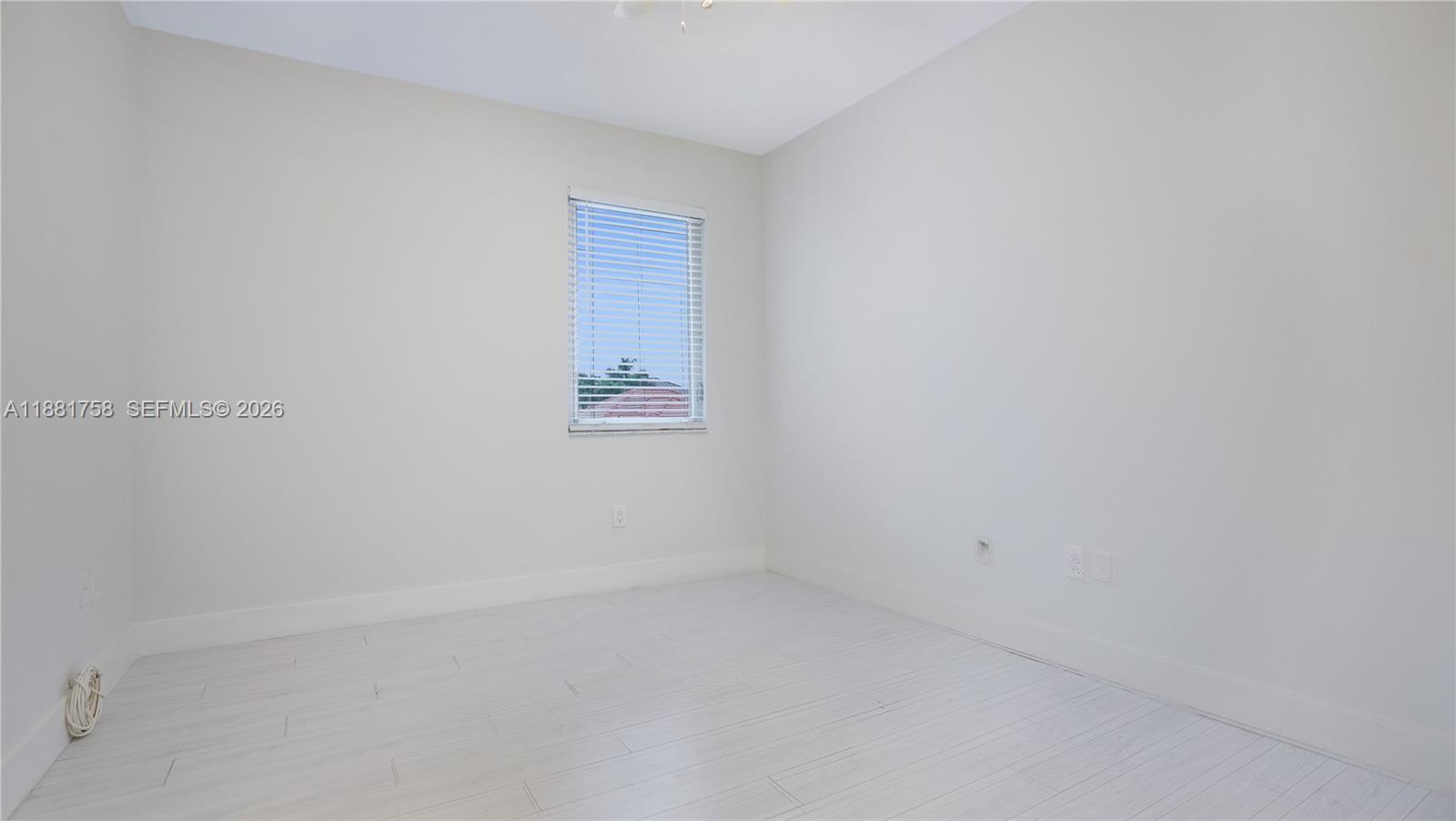 704 Northwest 129th Court Miami, FL 33182 - Photo 45 of 58 a view of an empty room