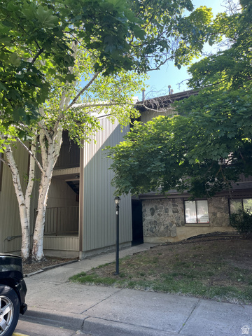 1175 Canyon Road, Unit A 5 Ogden, UT 84404 - Photo 8 of 15 Multi-level building exterior featuring a stone facade and vertical siding