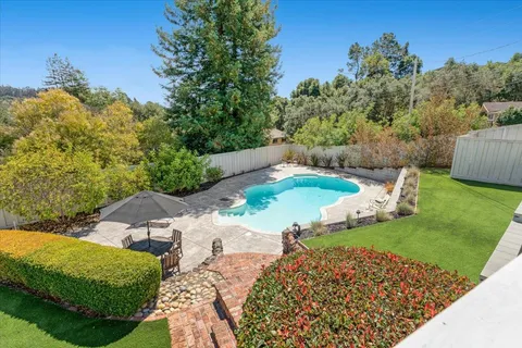 a view of a garden with an outdoor space