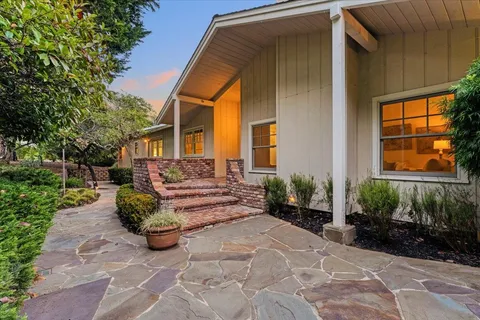 a front view of a house having patio