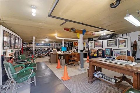 a room with lots of furniture and clutter