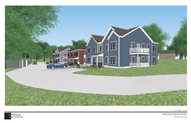 a aerial view of a house with a yard