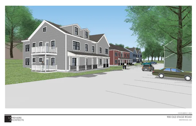 a aerial view of a house with a yard