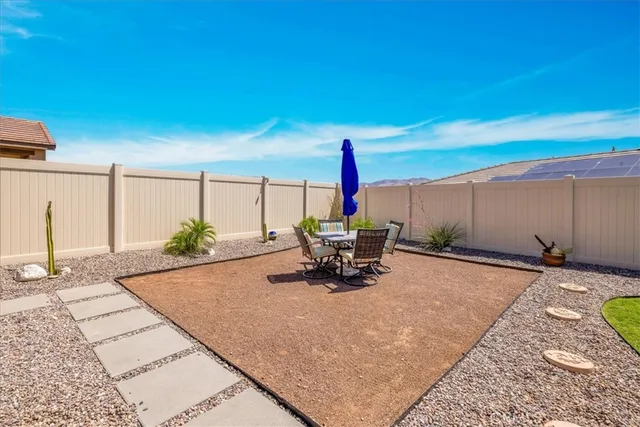 a view of a terrace with chairs
