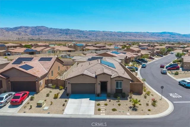 a view of roof house with a yard