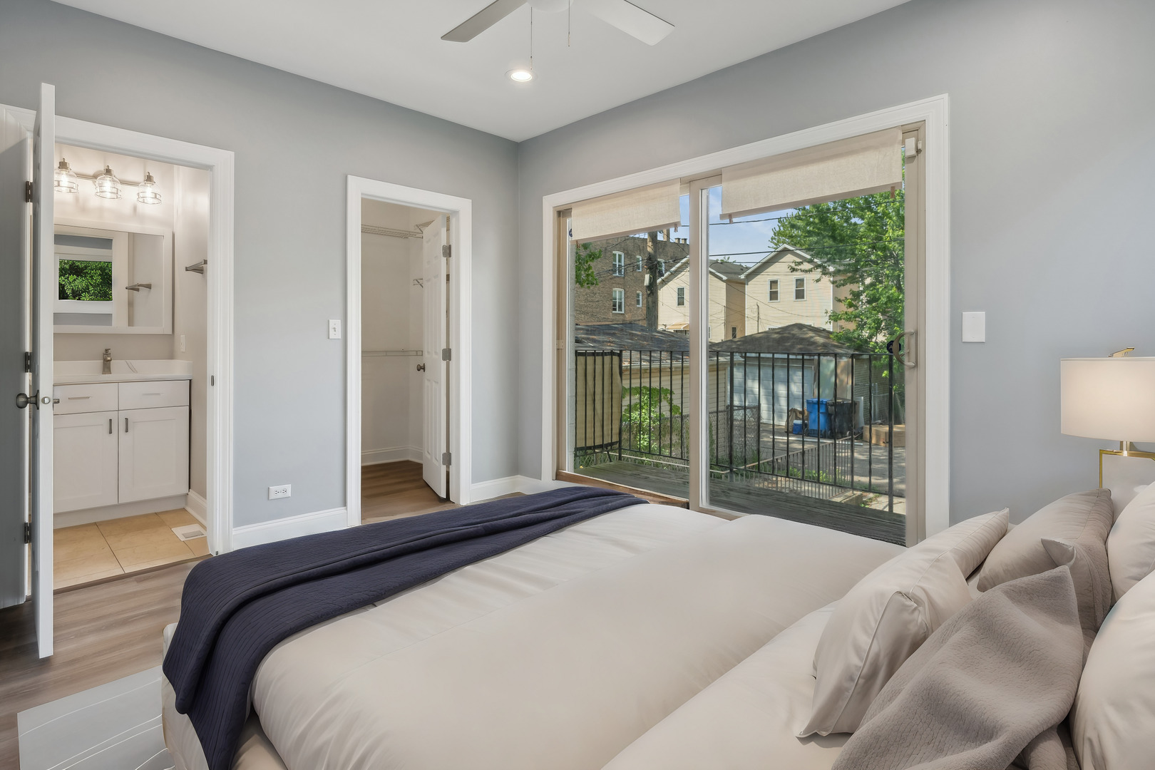 116 South Bell Avenue, Unit 1 Chicago, IL 60612 - Photo 13 of 30 a bed sitting in a bedroom next to a window