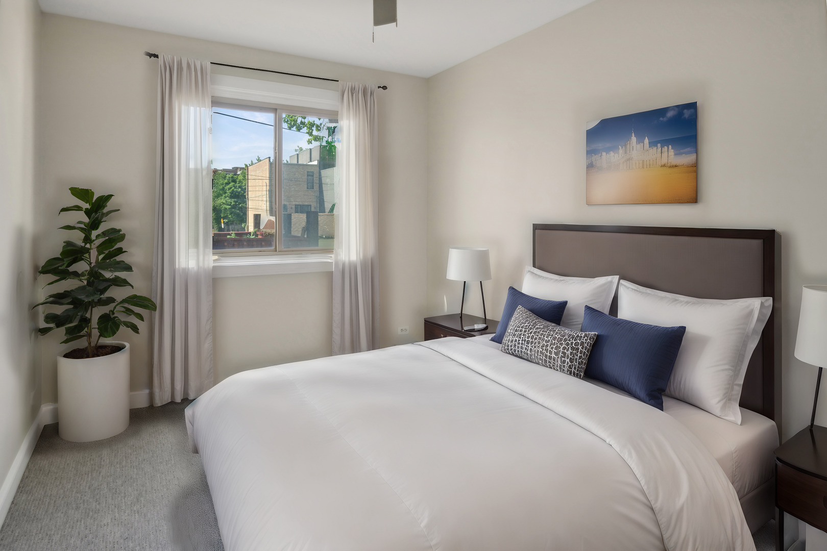 116 South Bell Avenue, Unit 1 Chicago, IL 60612 - Photo 19 of 30 a bedroom with a bed and a window