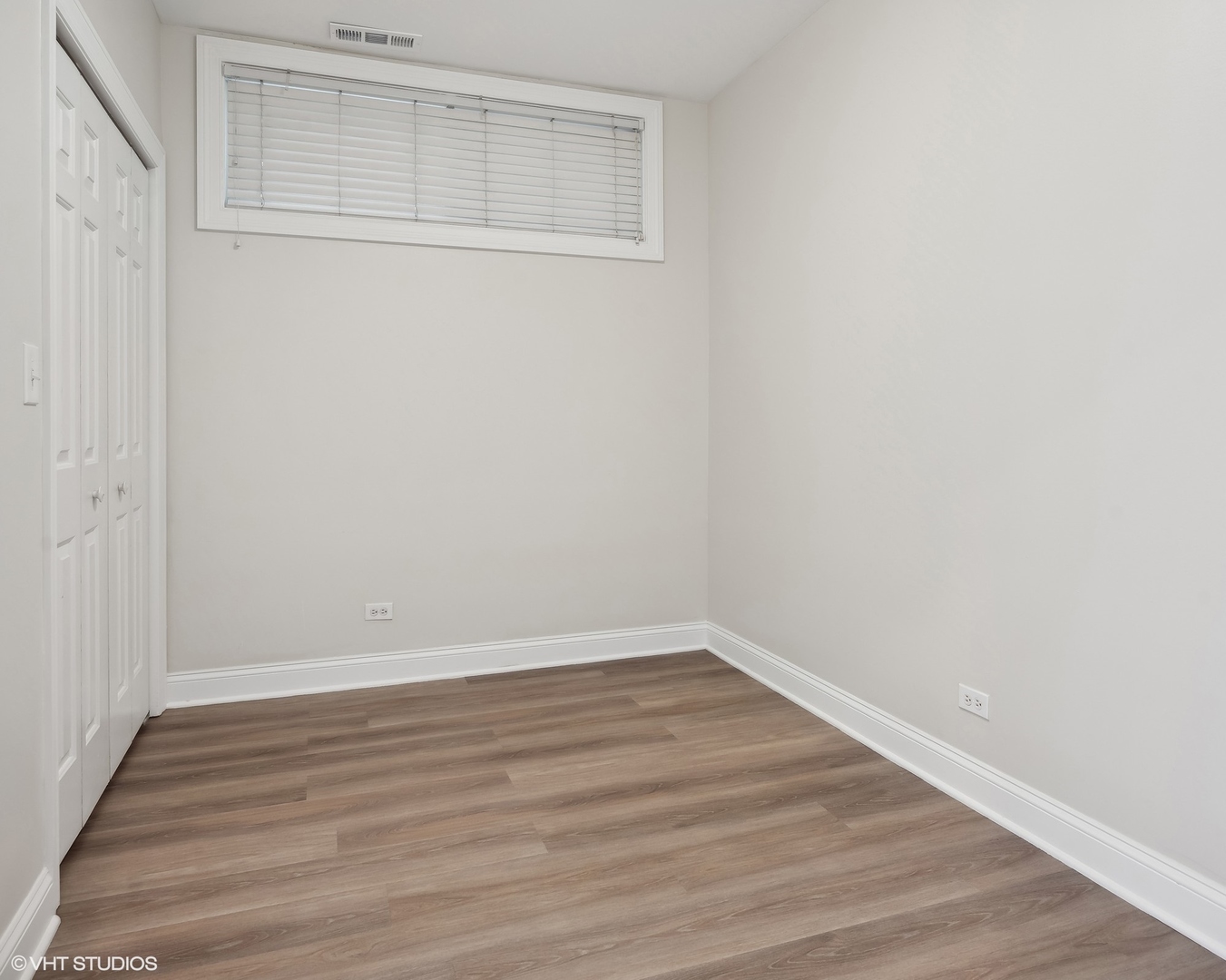 116 South Bell Avenue, Unit 1 Chicago, IL 60612 - Photo 23 of 30 wooden floor in an empty room
