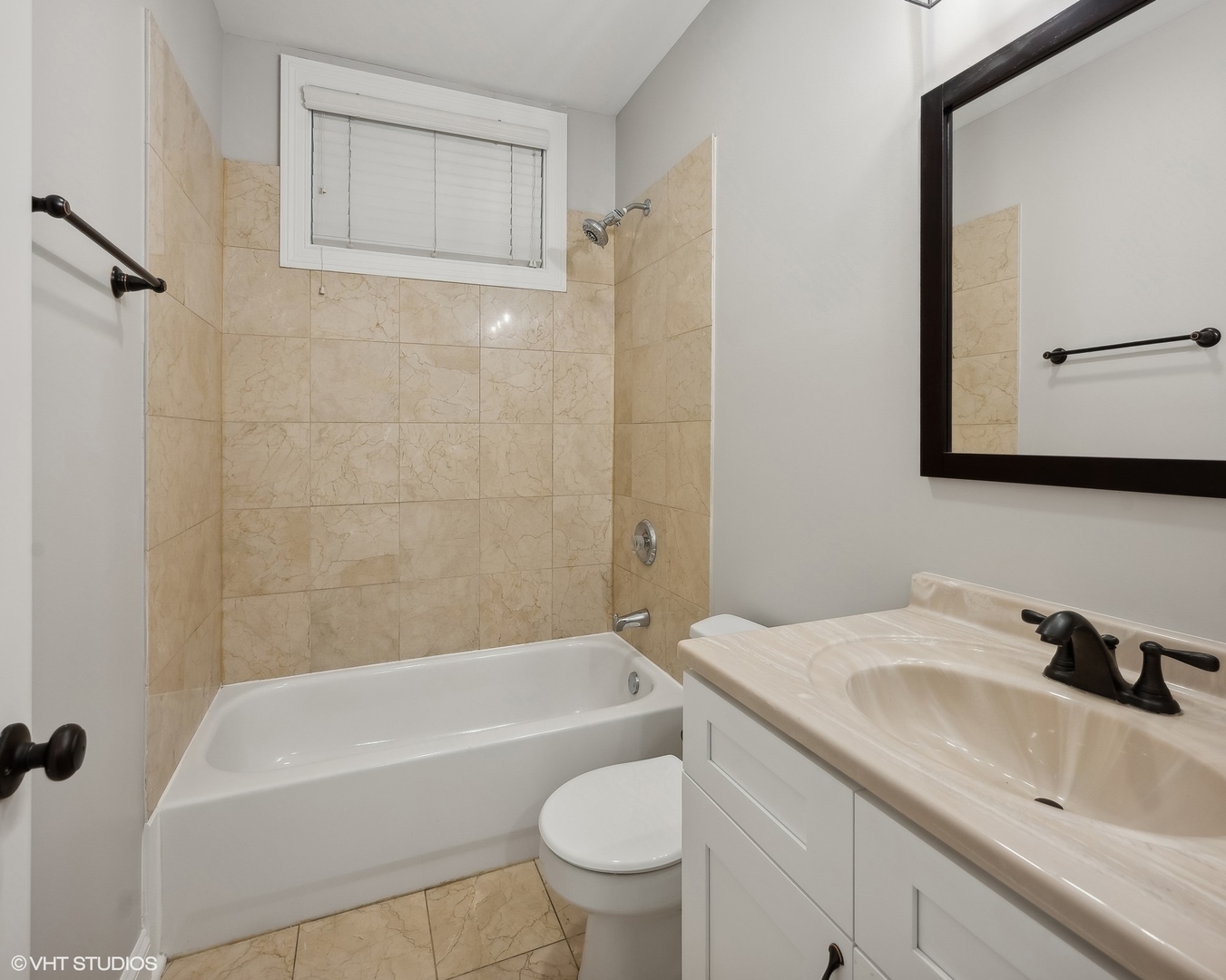 116 South Bell Avenue, Unit 1 Chicago, IL 60612 - Photo 25 of 30 a bathroom with a sink a toilet and a bathtub