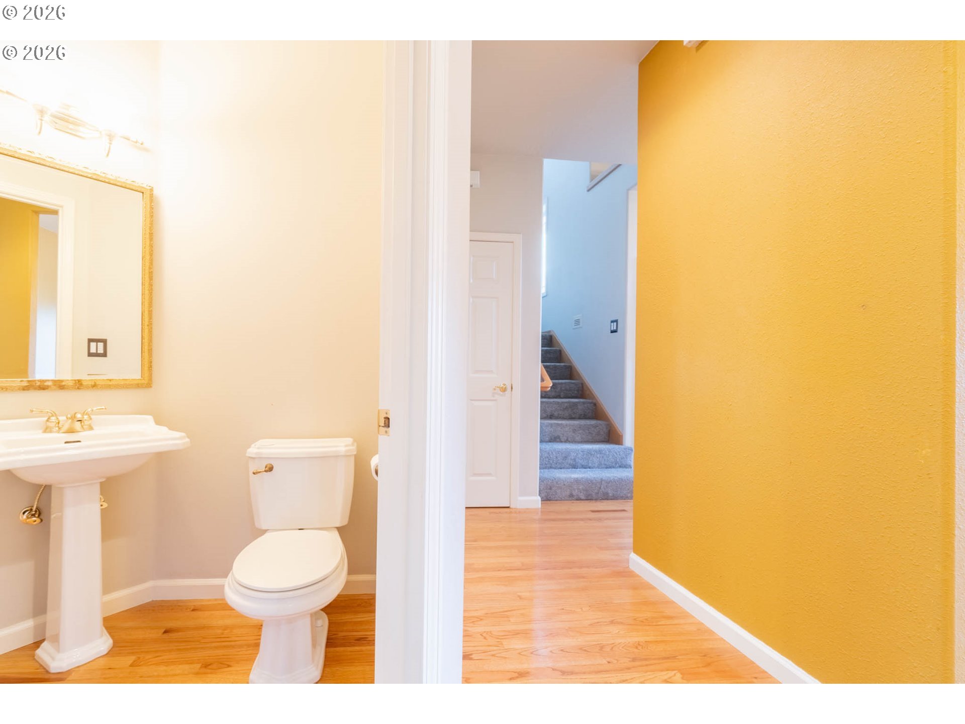 4366 Berry Lane Eugene, OR 97404 - Photo 18 of 36 a bathroom with a toilet sink and mirror