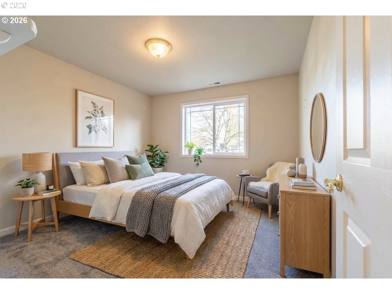 4366 Berry Lane Eugene, OR 97404 - Photo 25 of 36 a bedroom with a bed and wooden floor