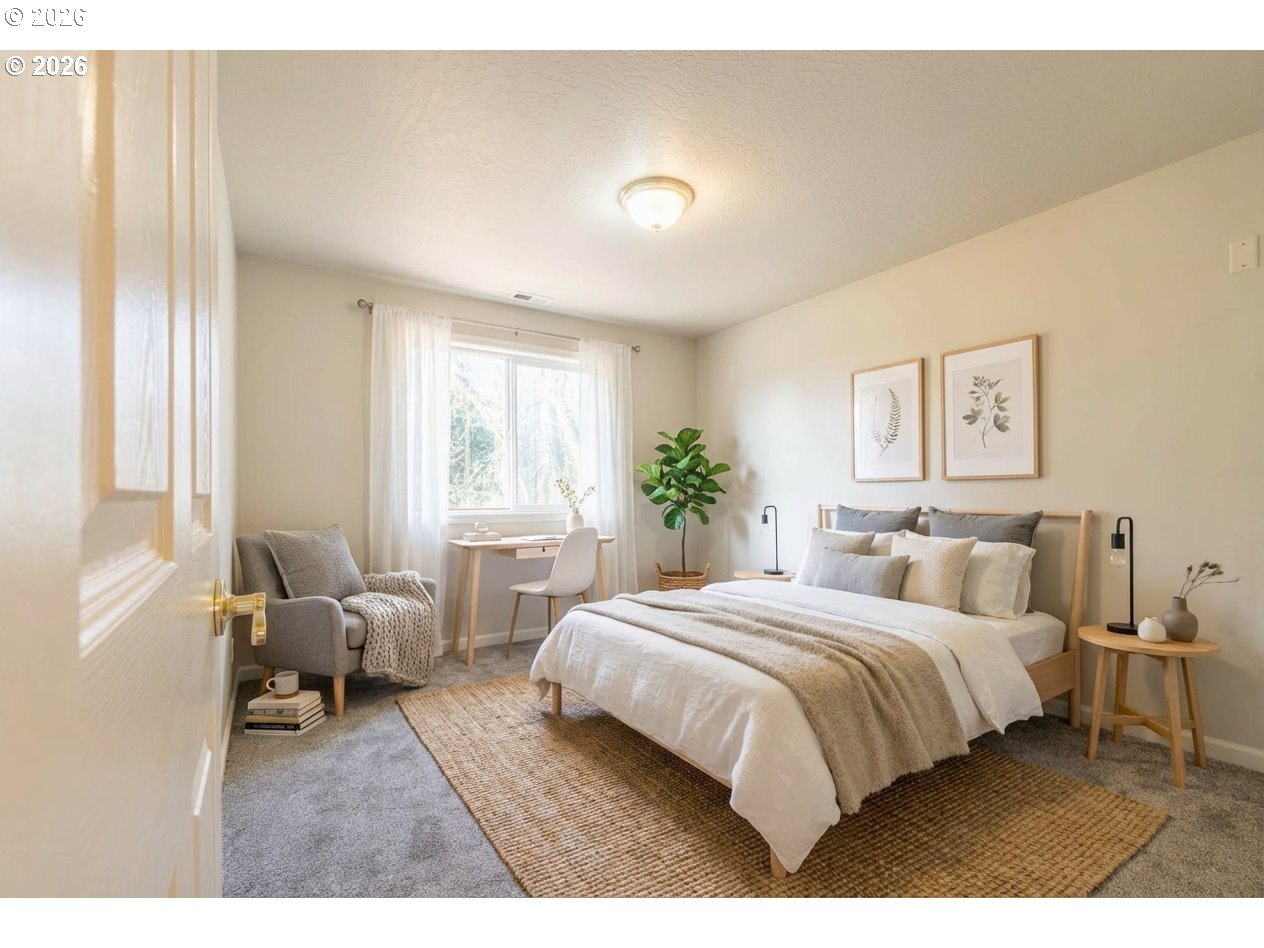 4366 Berry Lane Eugene, OR 97404 - Photo 27 of 36 a bedroom with a bed a table and chair