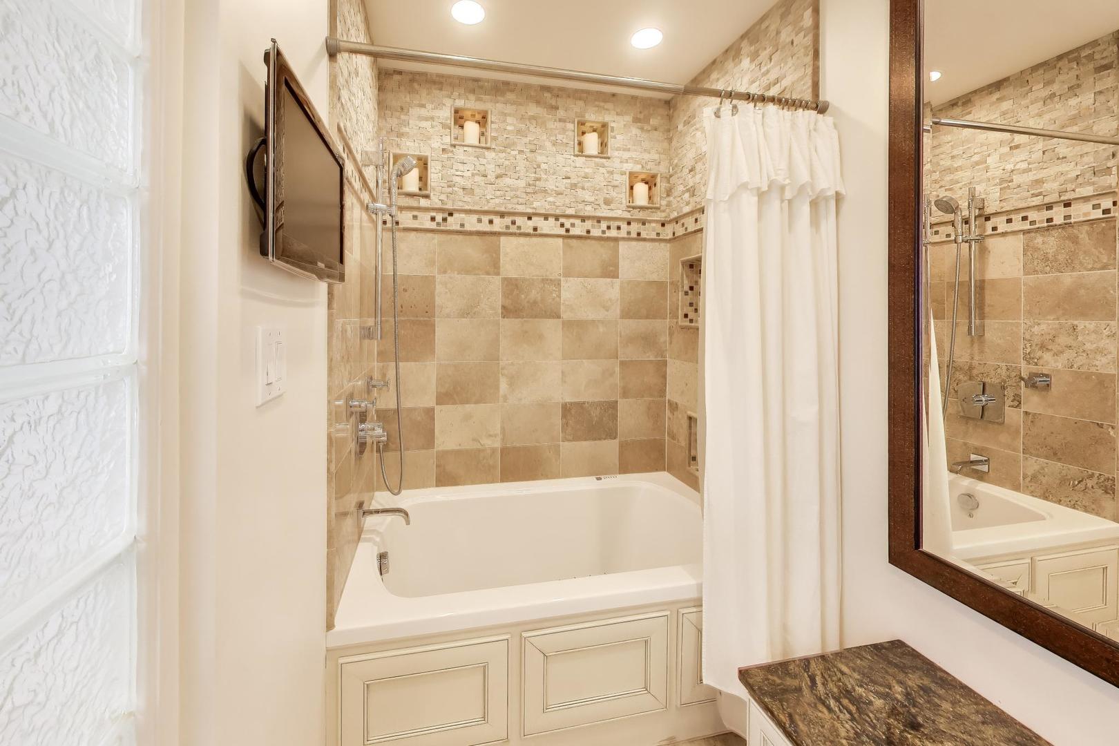 3956 Rutgers Lane Northbrook, IL 60062 - Photo 28 of 41 a bathroom with a shower and a bath tub