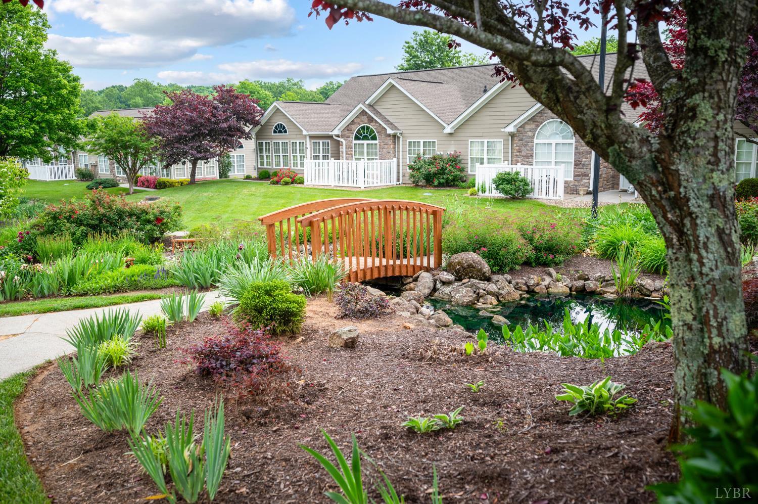 1159 Jefferson Way Forest, VA 24551 - Photo 18 of 43 a front view of a house with garden