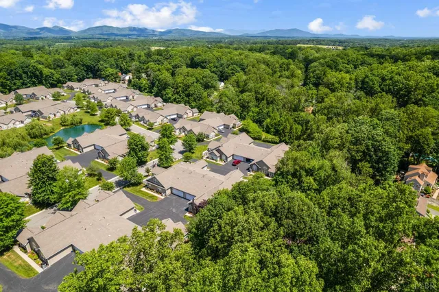 an aerial view of residential house with outdoor space