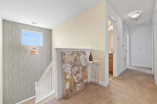 a white toilet sitting next to a bath tub