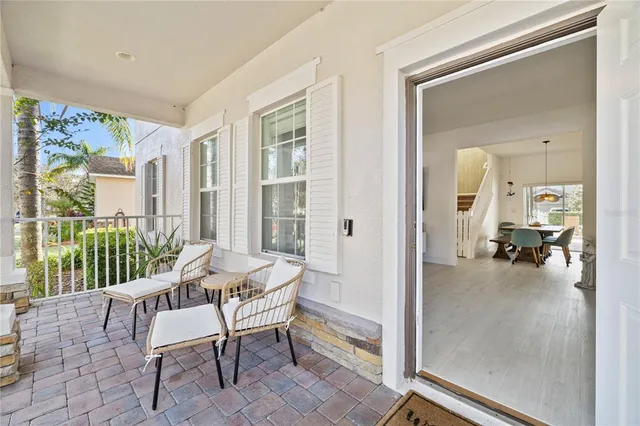 a view of a livingroom with furniture and wooden floor