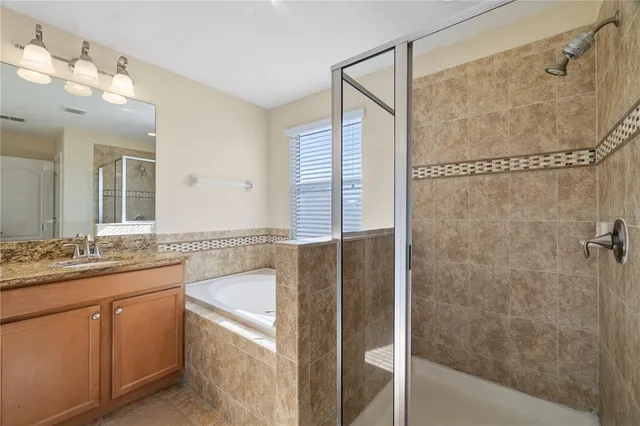 a view of a patio with a dining table and chairs