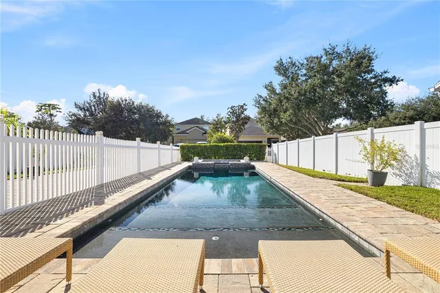 a view of living room with furniture and window