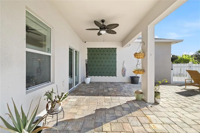 an aerial view of a house with a garden
