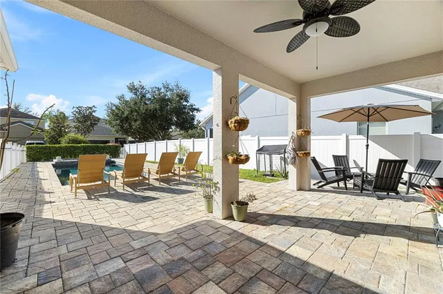 a view of house with yard outdoor seating and entertaining space