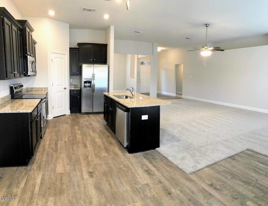 6268 Roxanne Way Biloxi, MS 39532 - Photo 8 of 25 Kitchen and great room