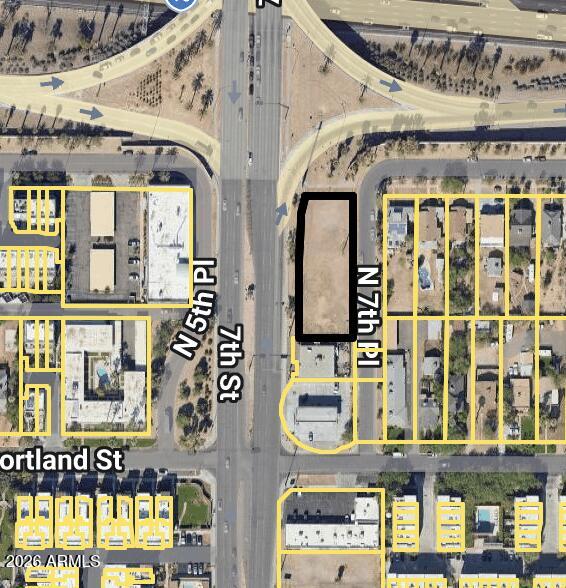 1125 North 7th Street Phoenix, AZ 85006 - Photo 5 of 8 a front view of a building with glass door and glass door