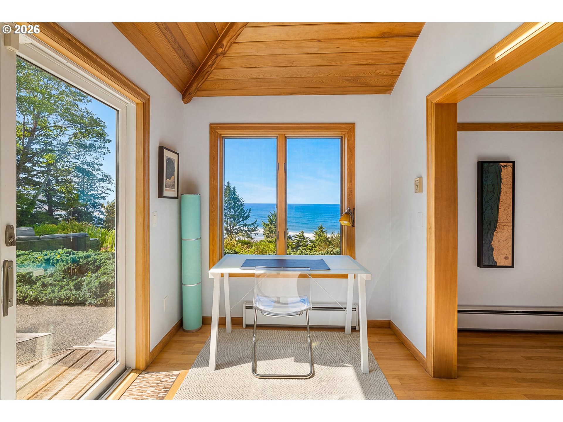 38295 Beulah Reed Road Nehalem, OR 97131 - Photo 23 of 42 a balcony with furniture and a gate