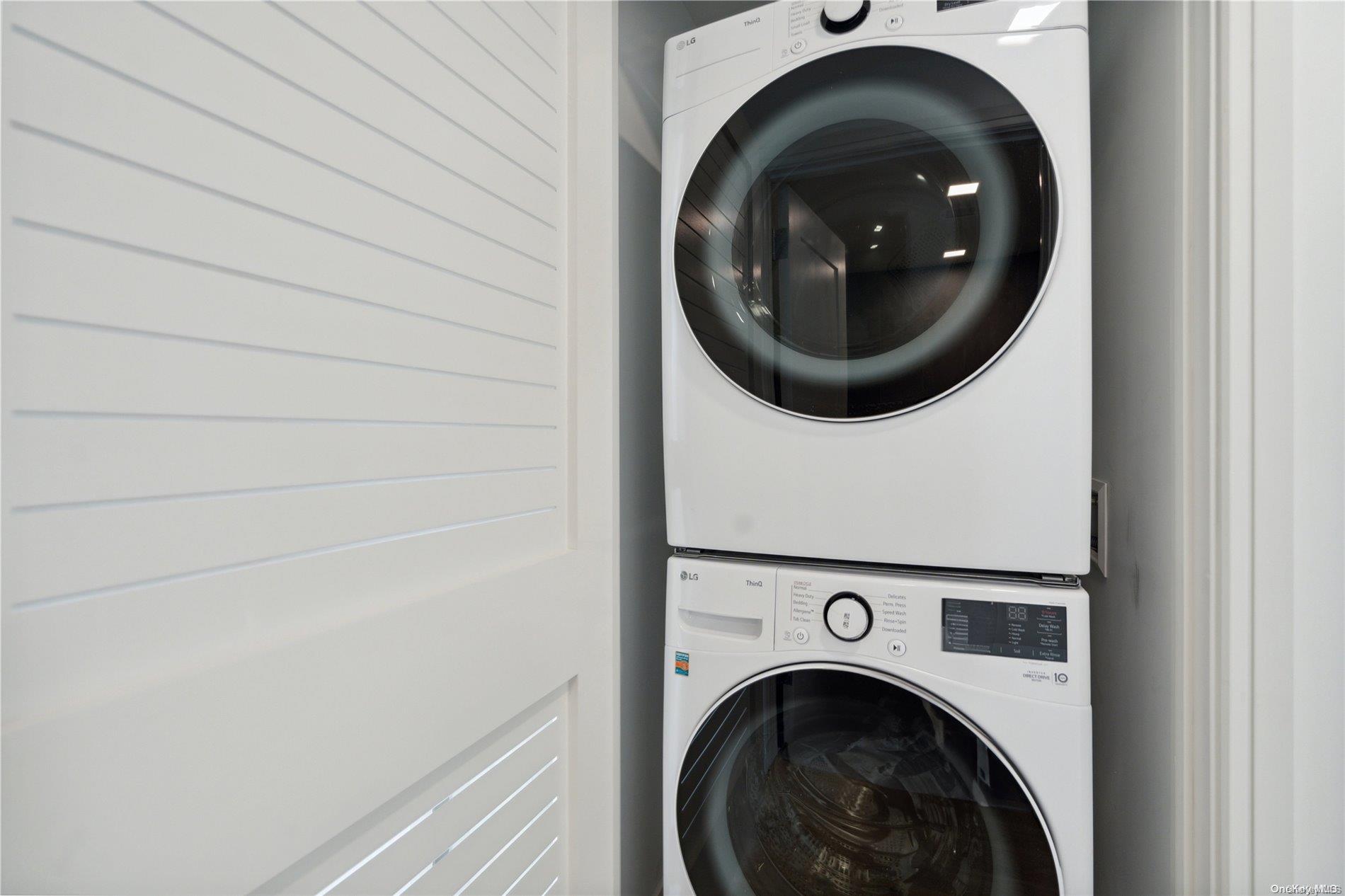 218 Middle Neck Road, Unit 314 Great Neck, NY 11021 - Photo 20 of 23 a close up view of a washer and dryer