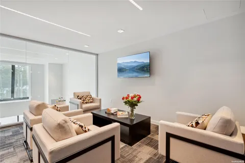 a living room with furniture and window