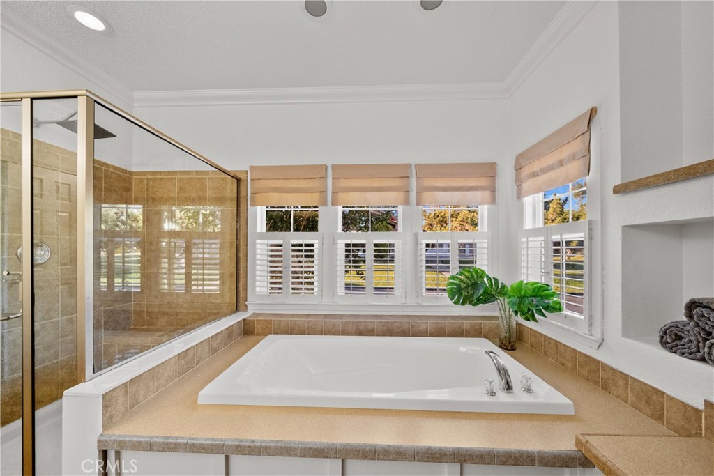 3909 Reche Road, Unit 60 Fallbrook, CA 92028 - Photo 19 of 37 a bath tub sitting in front of a window