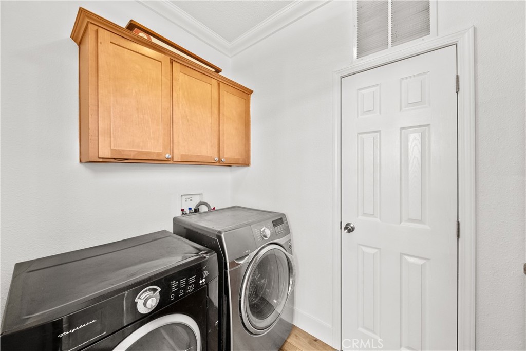 3909 Reche Road, Unit 60 Fallbrook, CA 92028 - Photo 24 of 37 a utility room with dryer and washer