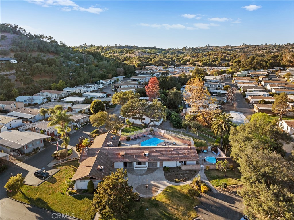 3909 Reche Road, Unit 60 Fallbrook, CA 92028 - Photo 32 of 37 an aerial view of residential houses with outdoor space