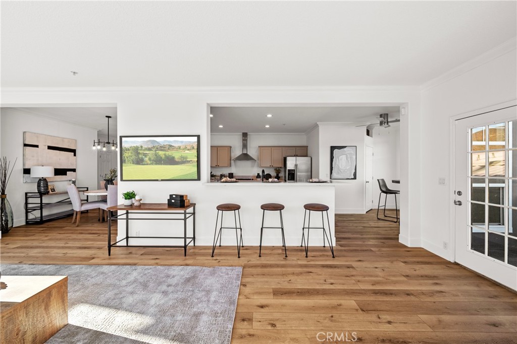 3909 Reche Road, Unit 60 Fallbrook, CA 92028 - Photo 7 of 37 a living room with furniture and wooden floor