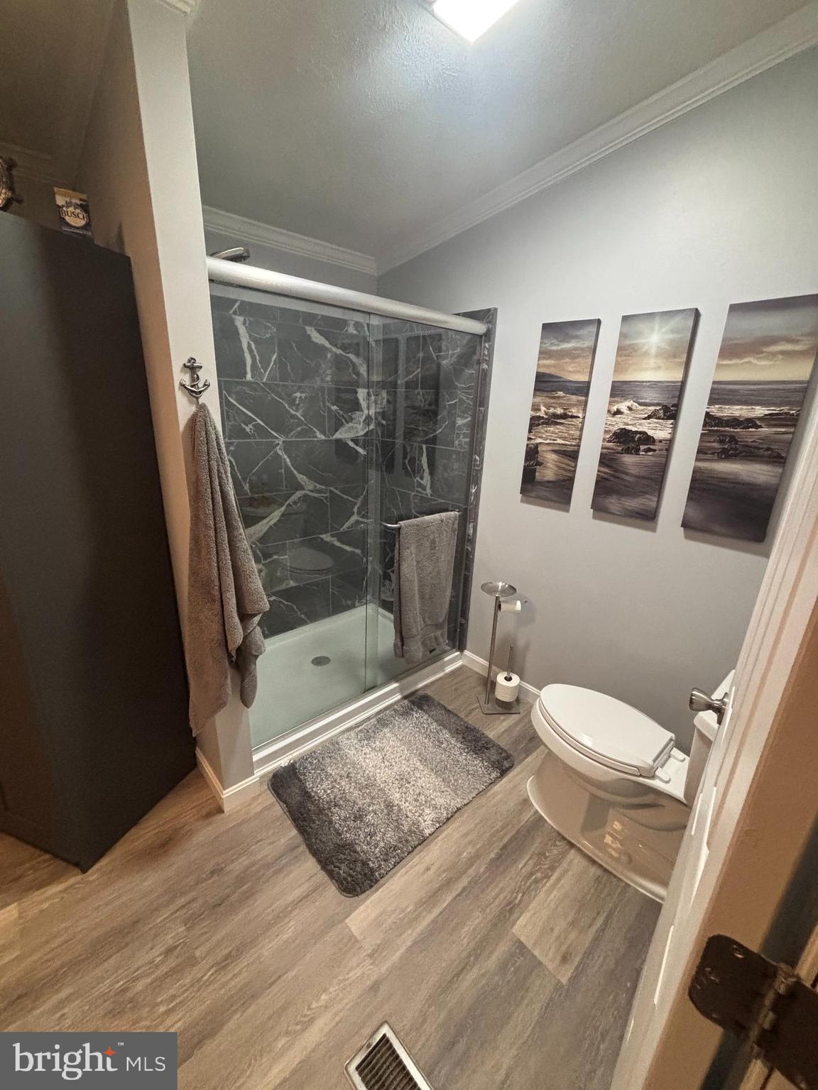 511 Sykesville Road, Unit 89 Wrightstown, NJ 08562 - Photo 5 of 12 a bathroom with a toilet and a shower
