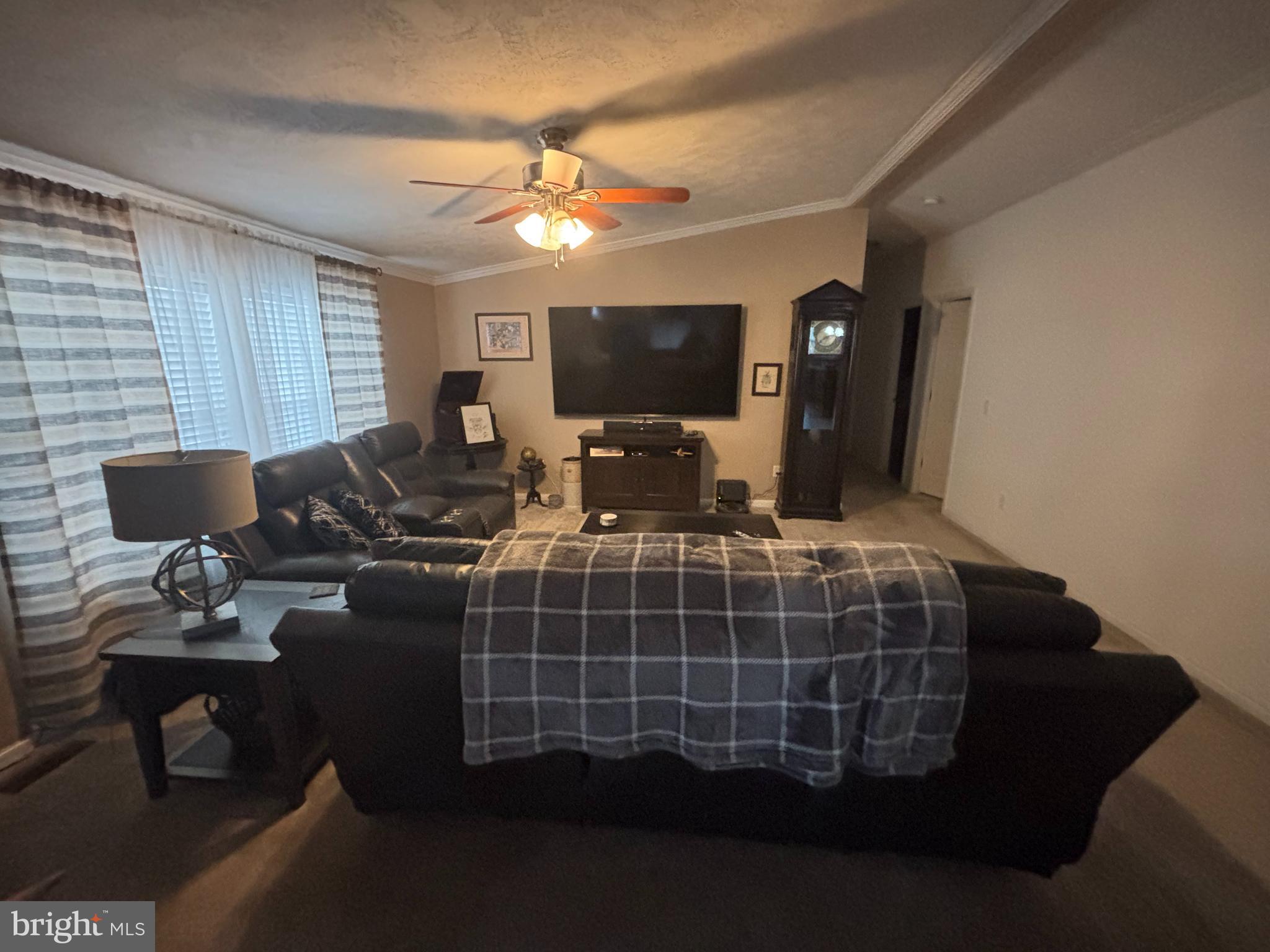 511 Sykesville Road, Unit 89 Wrightstown, NJ 08562 - Photo 6 of 12 a living room with furniture