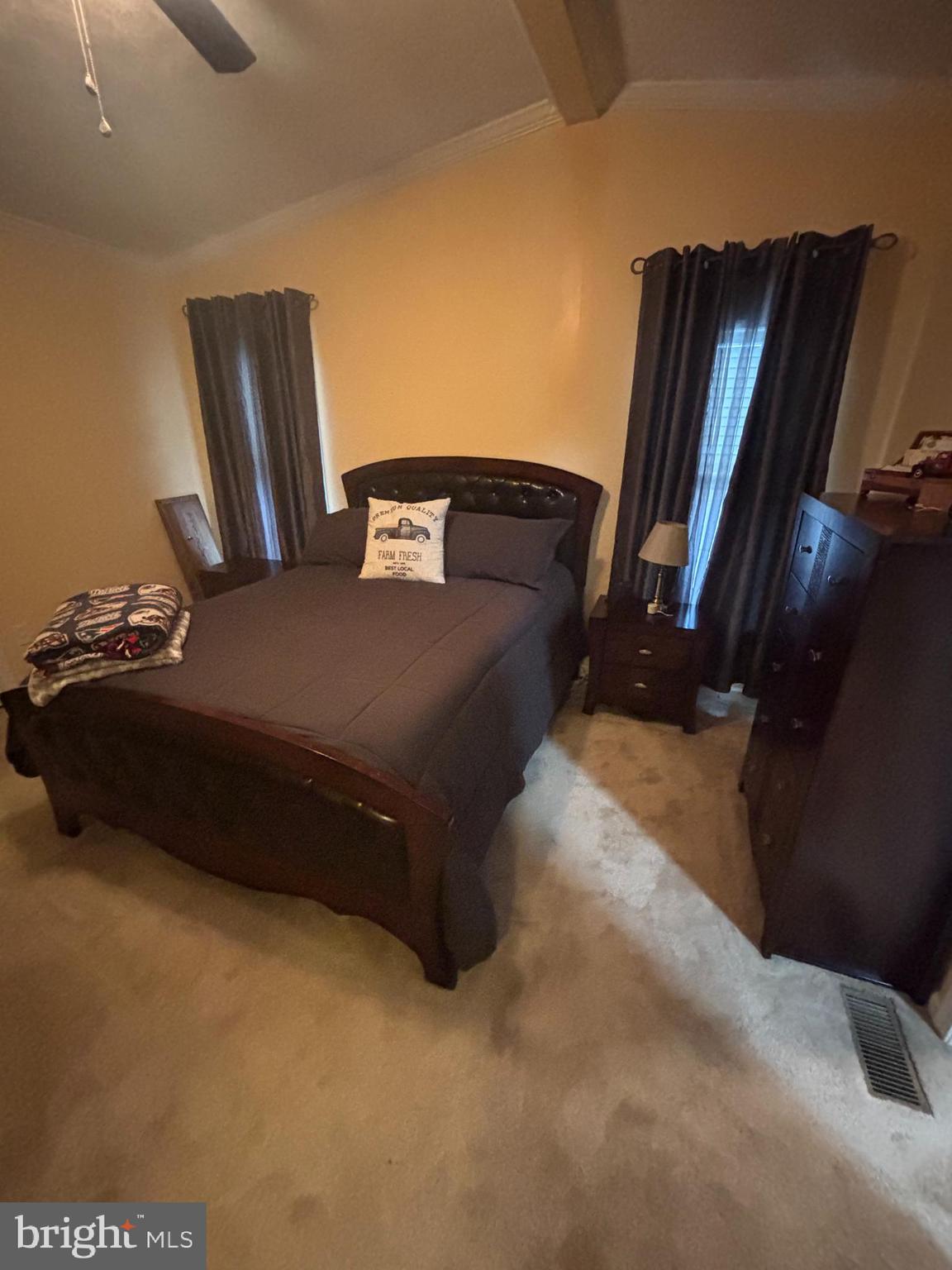 511 Sykesville Road, Unit 89 Wrightstown, NJ 08562 - Photo 9 of 12 a bed sitting in a bedroom next to a window