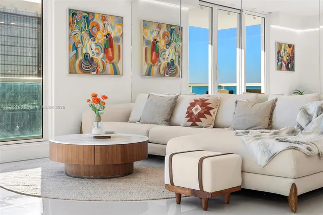 a living room with furniture and window