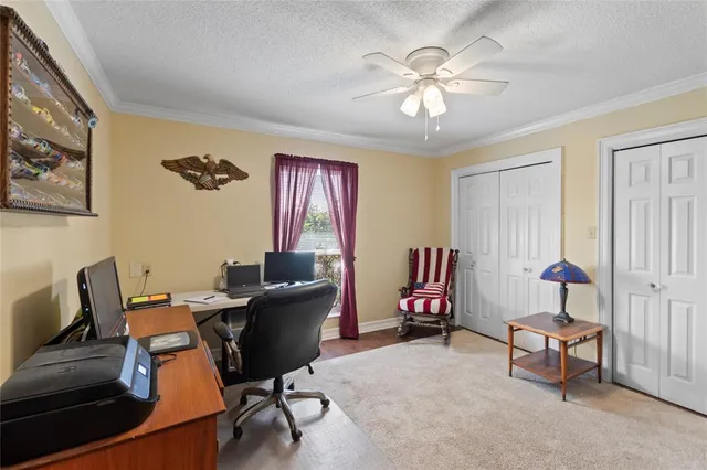 a bathroom with a sink vanity mirror and toilet