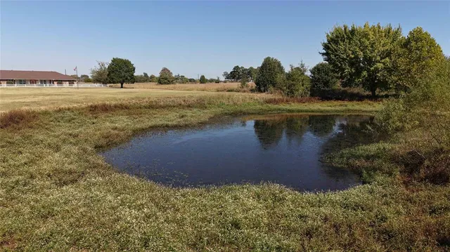 a view of a lake with outdoor space
