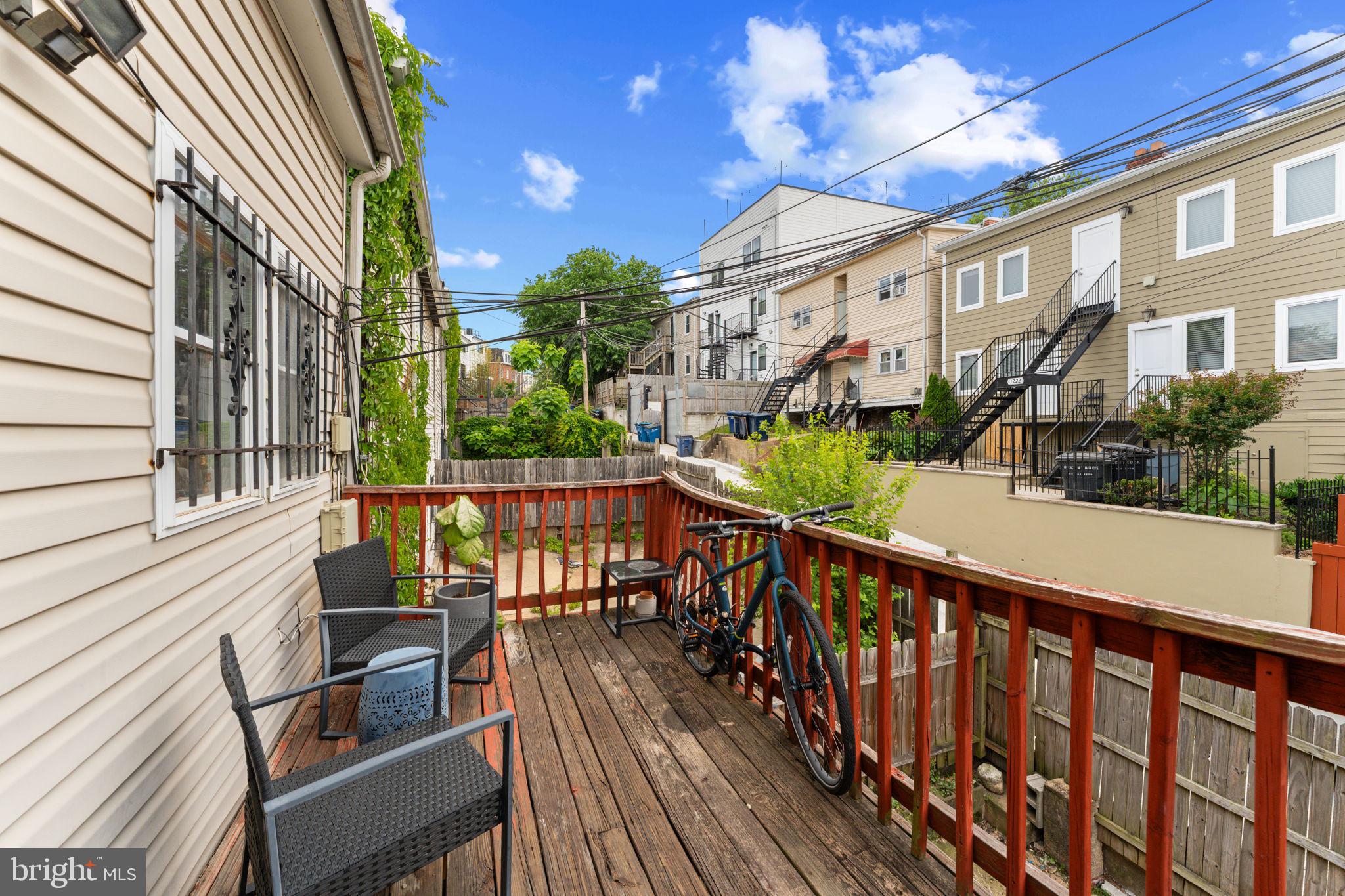 1219 Holbrook Terrace Northeast, Unit 3 Washington, DC 20002 - Photo 13 of 14 Charming deck with vibrant views.
