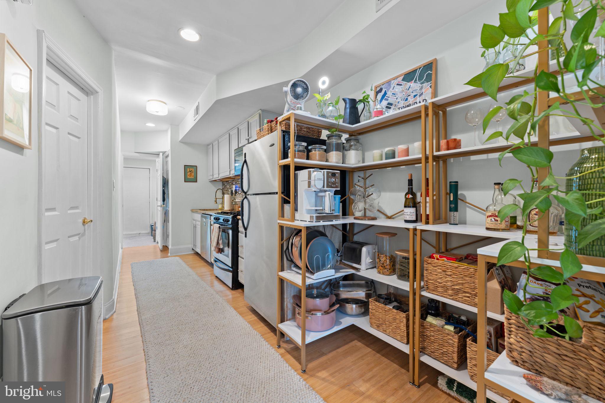 1219 Holbrook Terrace Northeast, Unit 3 Washington, DC 20002 - Photo 4 of 14 Charming hallway with stylish storage.