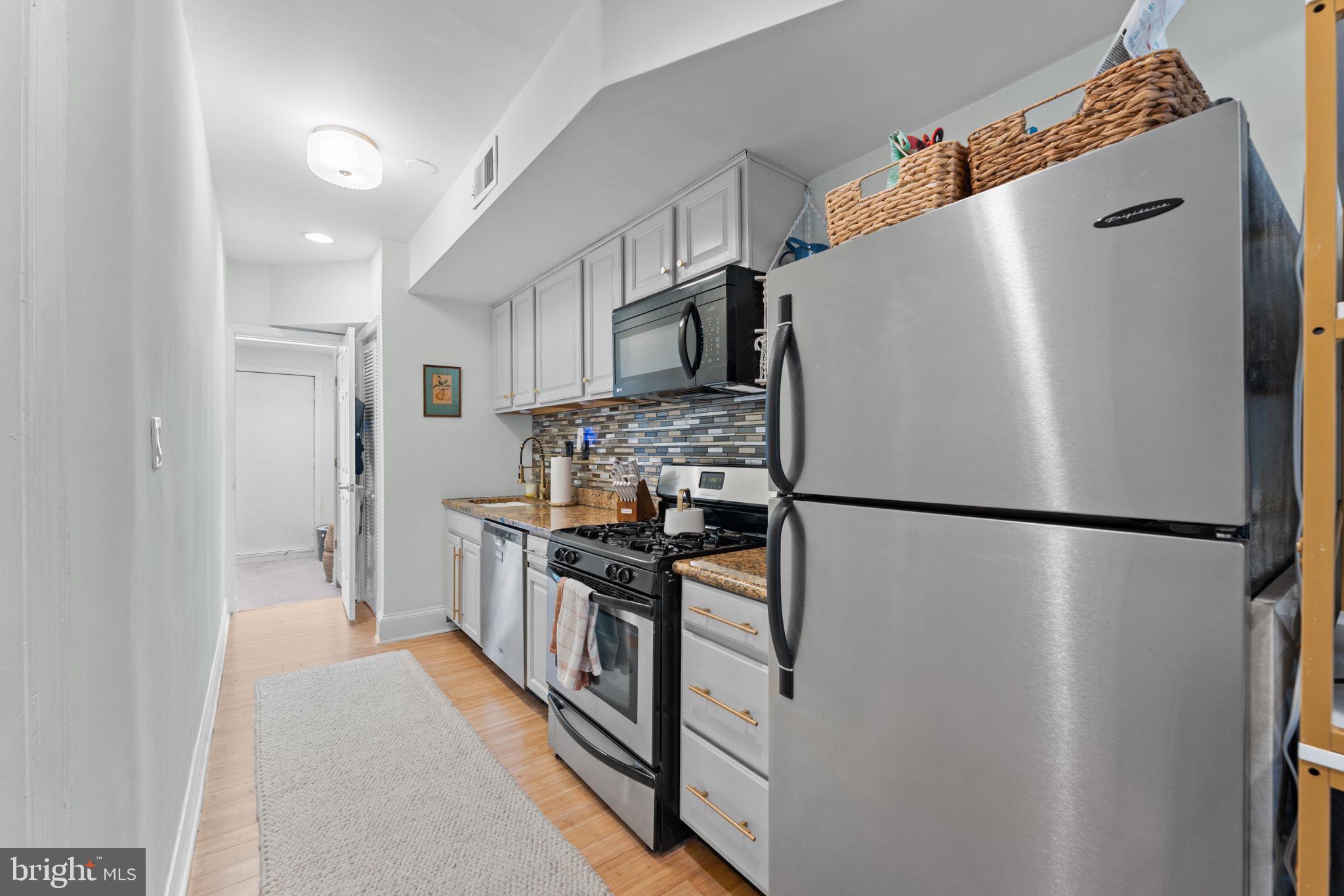 1219 Holbrook Terrace Northeast, Unit 3 Washington, DC 20002 - Photo 5 of 14 Modern kitchen with sleek appliances.