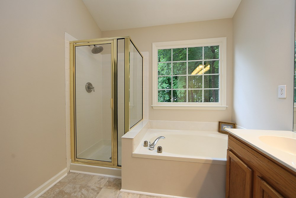 9712 Miranda Drive Raleigh, NC 27617 - Photo 15 of 25 Spacious master bath with separate tub and shower. Master Bath/Spa