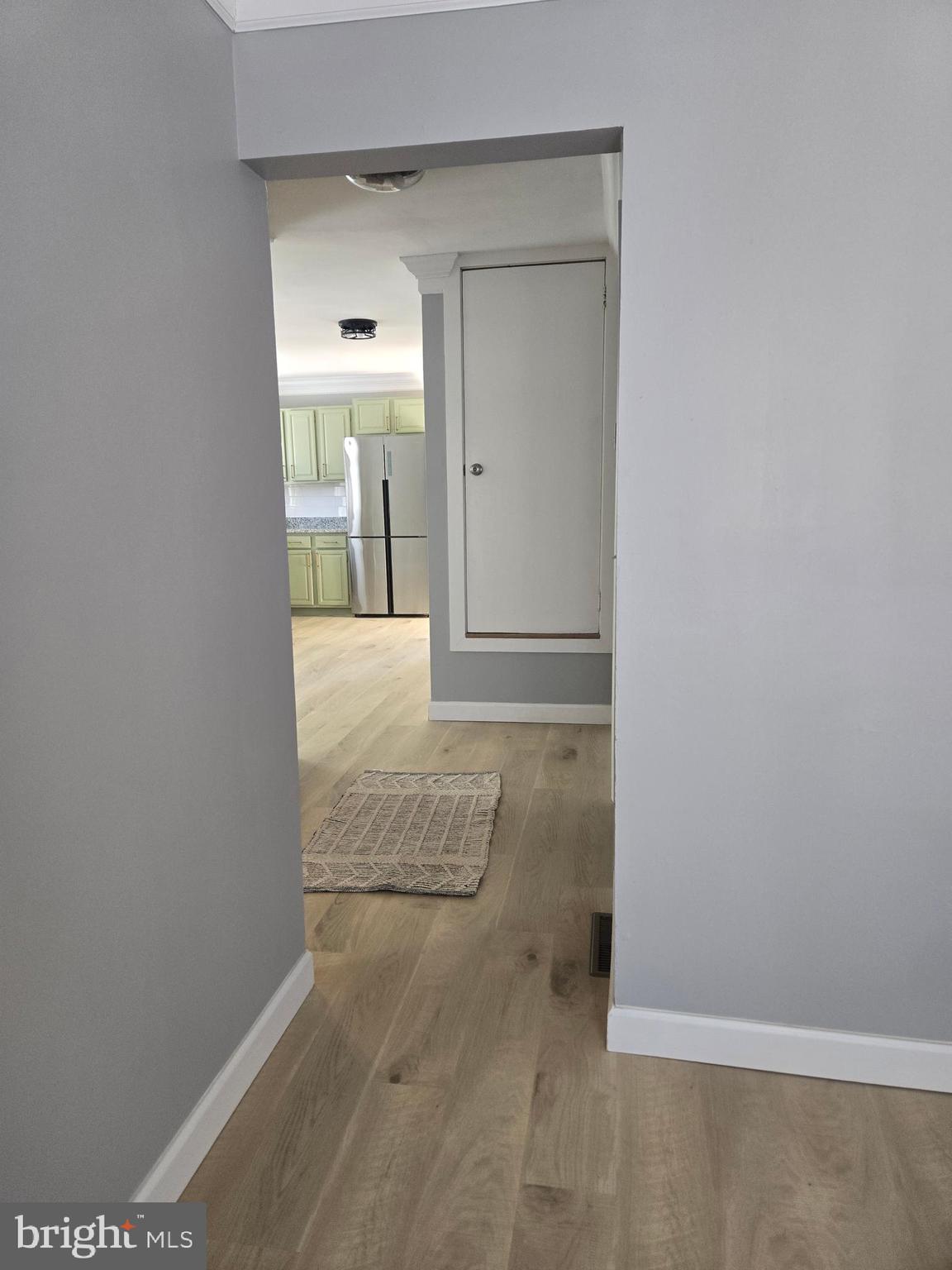 975 Williams Street Cumberland, MD 21502 - Photo 16 of 33 a view of a hallway with wooden floor