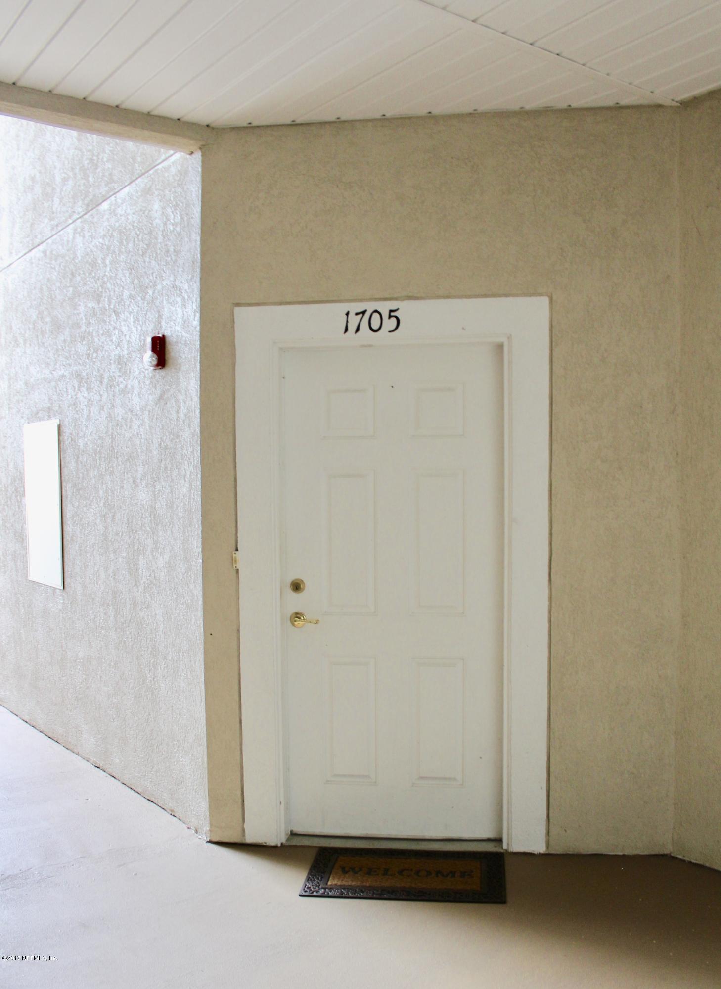 7920 Merrill Road, Unit 1705 Jacksonville, FL 32277 - Photo 2 of 25 a view of cupboard