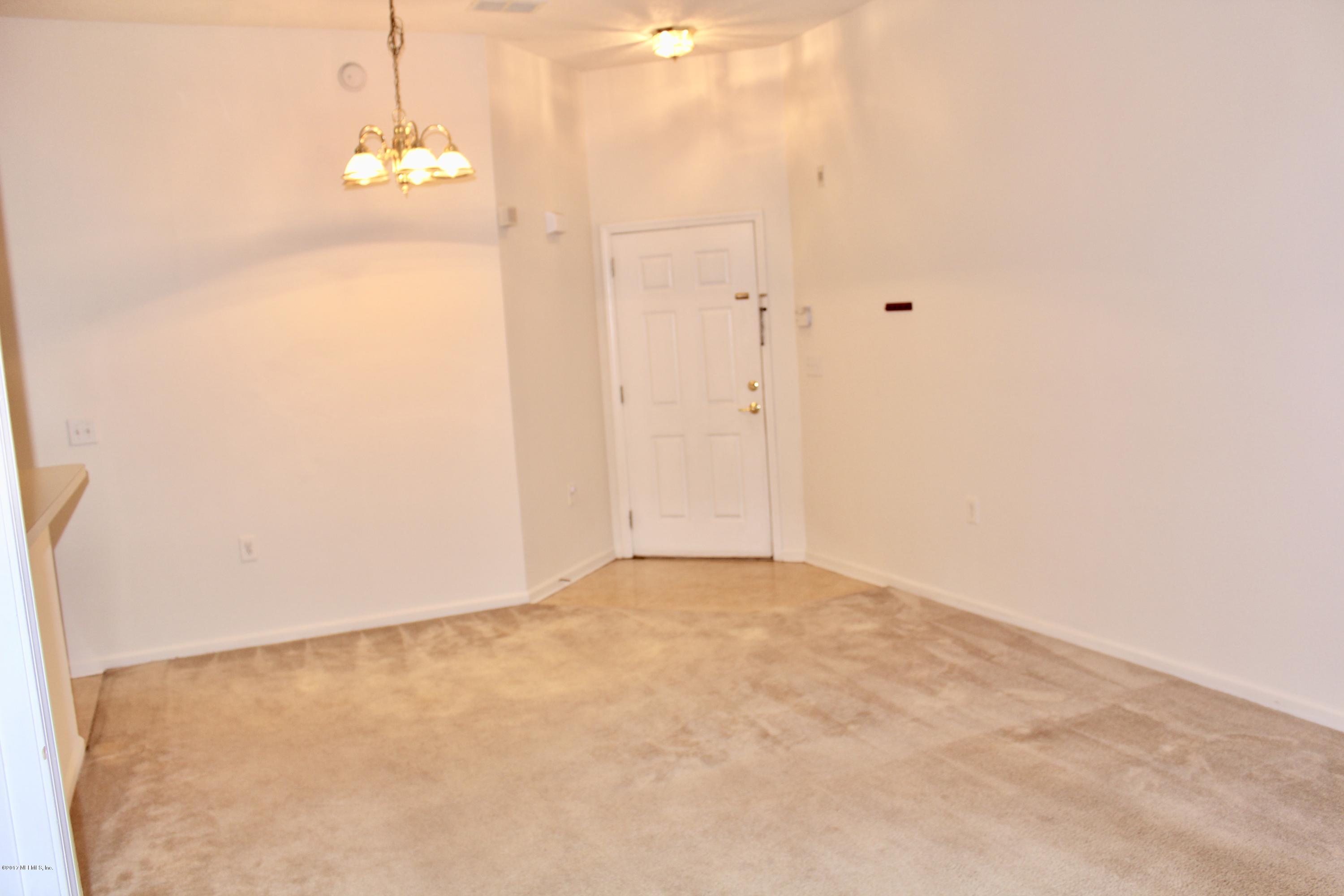 7920 Merrill Road, Unit 1705 Jacksonville, FL 32277 - Photo 4 of 25 a view of an empty room