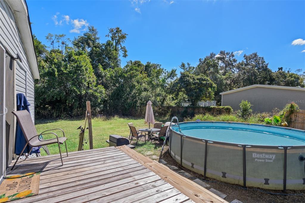 460 Korbus Road Brooksville, FL 34604 - Photo 19 of 22 a view of a swimming pool with a patio