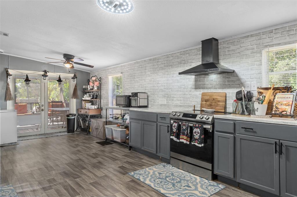 460 Korbus Road Brooksville, FL 34604 - Photo 10 of 22 a kitchen with lots of counter top space and appliances